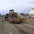 Yellow bulldozer truck on site